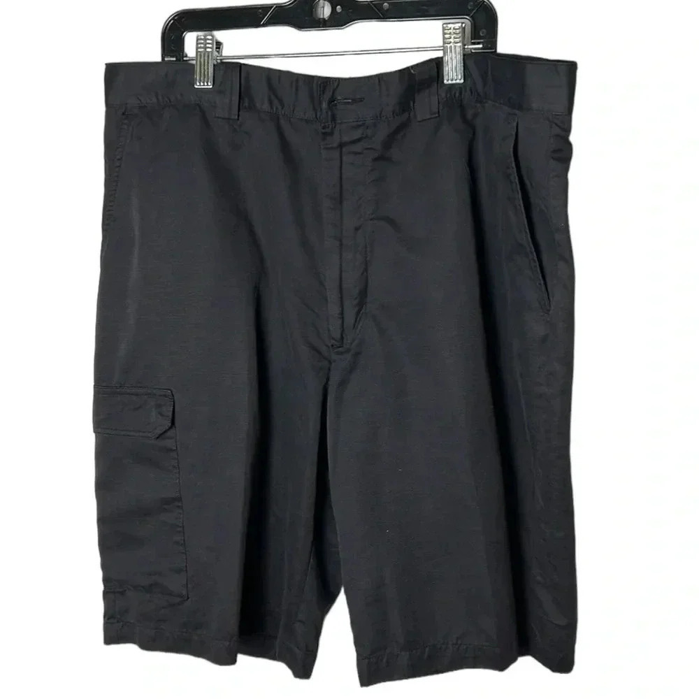 Grand  Slam golf shorts , men size 36”. Navy blue, cargo side pocket , logo